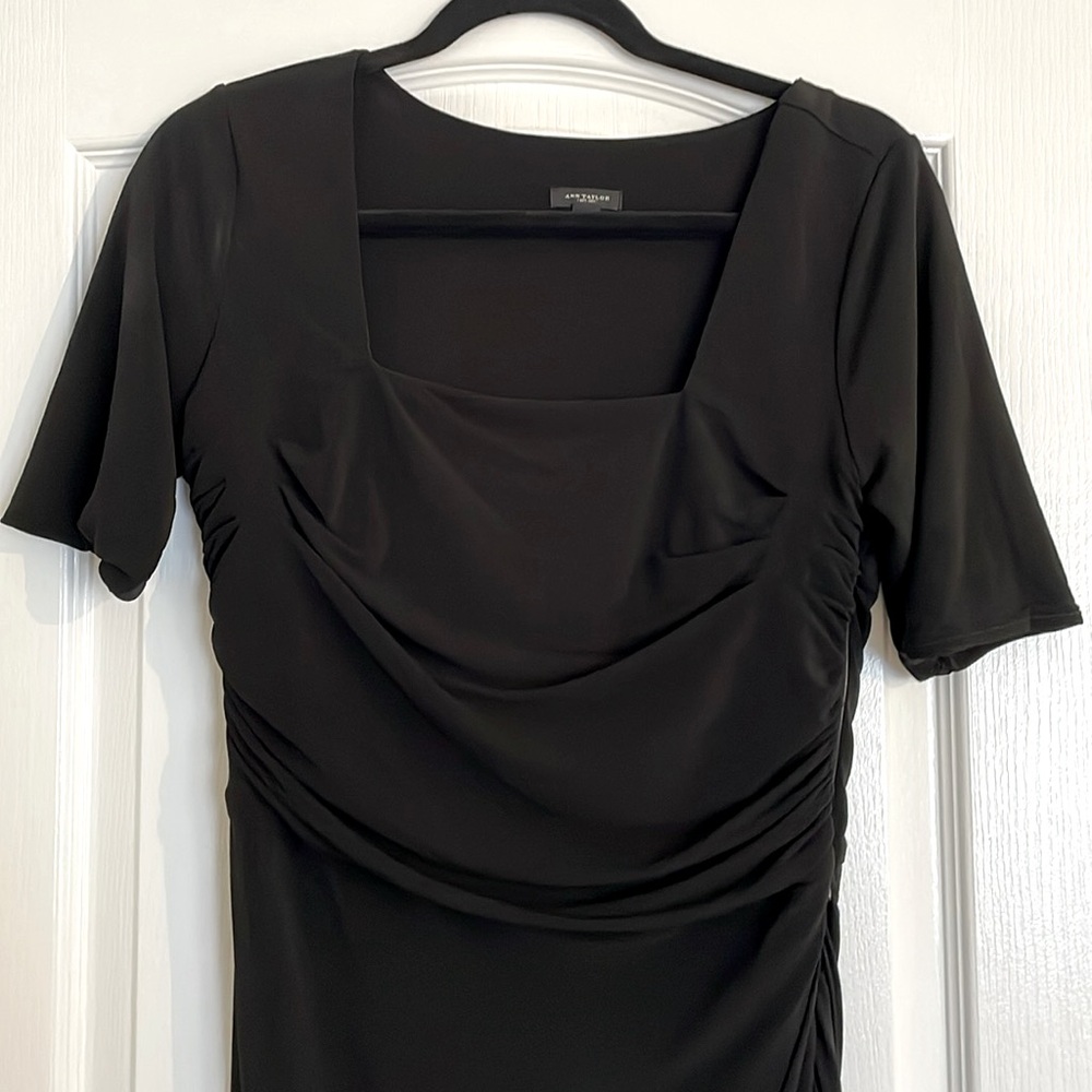 Sexy little black cocktail dress with sleeves